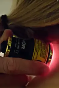 THOR®-Low-Level-Laser-Therapy-Treatment A low-level laser device held to a neck for neck pain. Get THOR® Low-Level Laser Therapy from Discovery Health Healing Center in Green Bay.